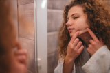 What are some of the basic skincare tips to prevent acne?