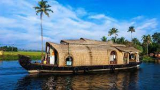 Cruising Through Tranquility: Exploring Alappuzha with Kerala Houseboat Packages